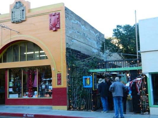 LIke a small street fair. Food, vendors & shops plus patio seating.