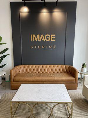 Wait in our lobby area inside Image Studio for your service.