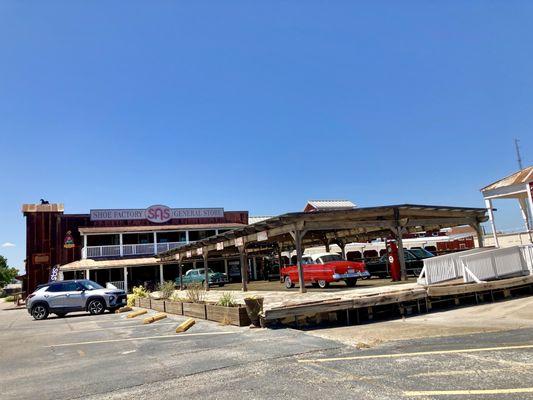 Classic cars as you enter the side of the store