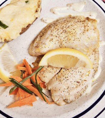 The tilapia special with stuffed potato.