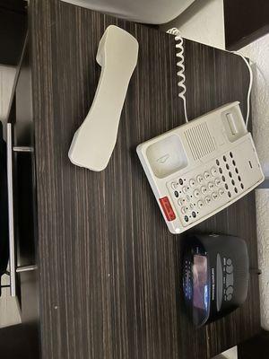 Broken phone. Broken clock