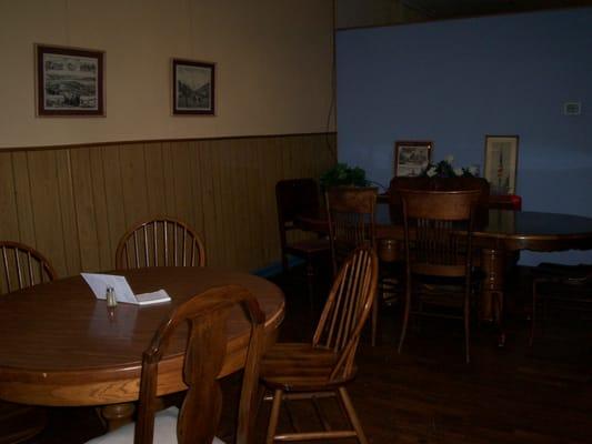 Ecclectic homey mix of table and chairs.