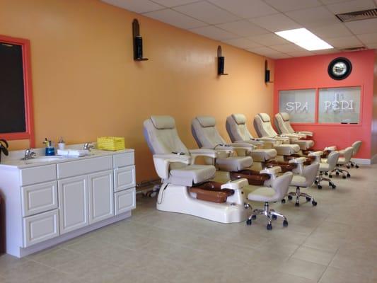 These pedicure chairs are brand new. With three speakers above, you can enjoy classical music while you're getting your pedicure