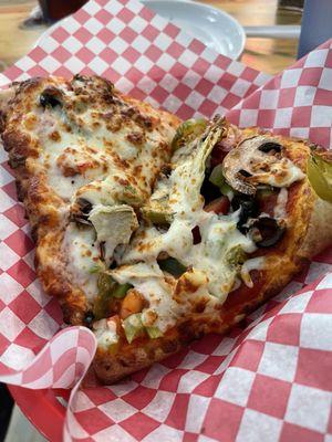Veggie pizza slice