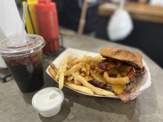 I have myself a BBQ bacon cheddar burger 1/2 lb Added the onions rings