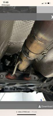 This was the work they did to my car. Supposedly a broken bolt. All I see is weld marks and another catalytic