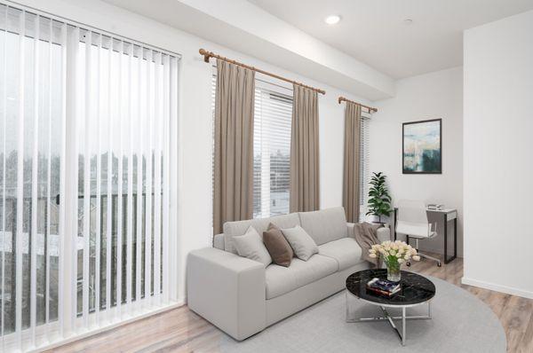 Living Room with large windows and sliding glass doors