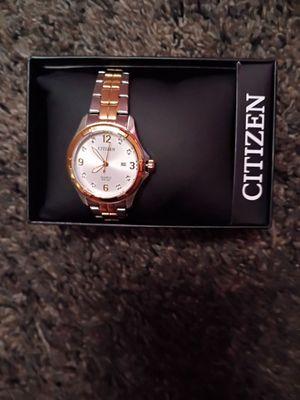 Brand new citizens women's watch still in the box and got the certificate trying to sell it