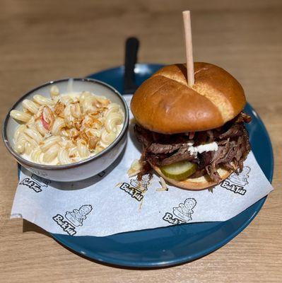 The X Man ... brisket, pork, Thai sausage, pickle, papaya slaw and creamy tiger cry sauce.