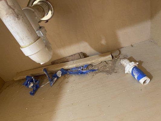 This is a brand new cabinet and new plumbing and this is how they left it filled with debris.