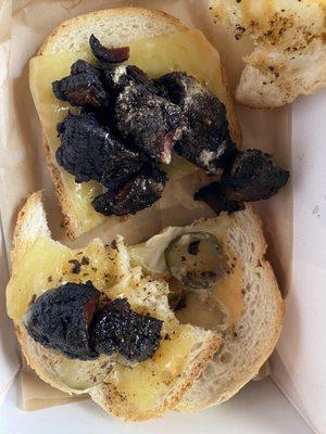 This is the burnt meat on the sandwich called the giddyup. It's not even edible don't order for them.