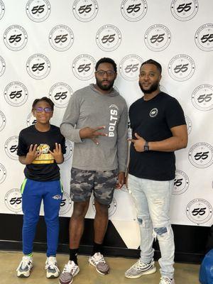 Antonio Cromartie stops in with his kids to get some fresh haircuts