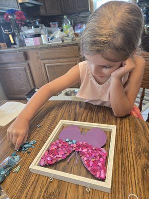 She really liked the pink and blue stones. We cant wait to hang it up.