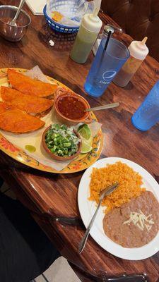 Chicken quesabirria with beans and rice