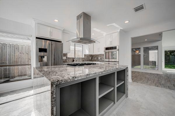 Beautiful Kitchen to one of my listings. Italian Granite Waterfall Island.