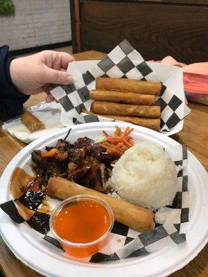 Combo A: Bar-B-Que Chicken, 2!pieces of lumpia & rice and an extra order of 5 pieces of lumpia