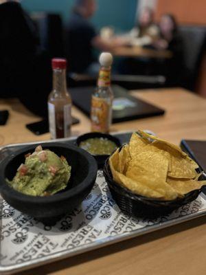 Corn chips with salsa Verde and guac