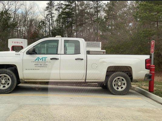 Company truck recently seen intentionally blocking a Tesla electric car station.