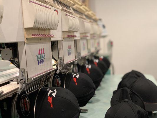 Flexfit caps with custom logo flat embroidery.