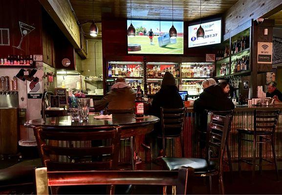Full bar as you walk in with lots of TVs around