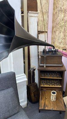 Vintage (and fully functional!) 1903 gramophone with a collection of original tubes (aka records/tracks)
