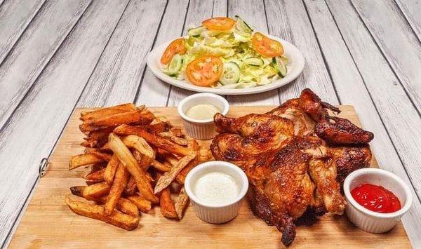 Pollo a la Brasa: Peruvian grilled chicken with fries & salad