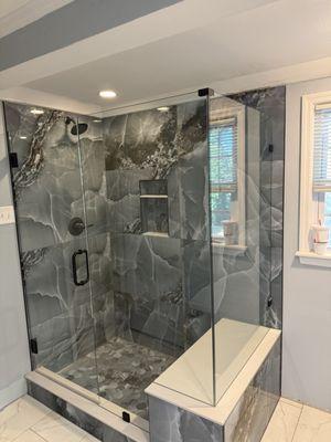 Custom shower install with 24x48 tile with custom glass