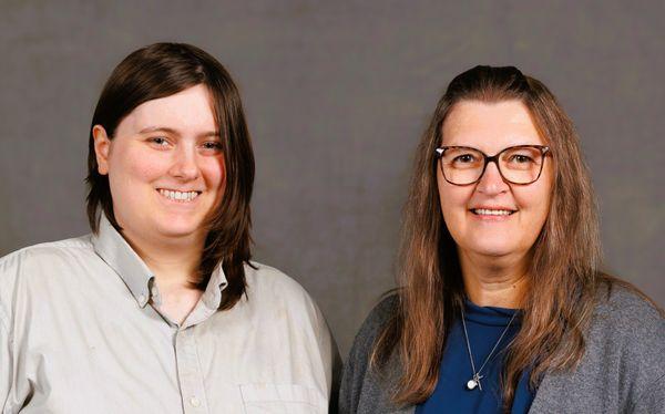 Receptionist Aaron and legal Assistant Melissa