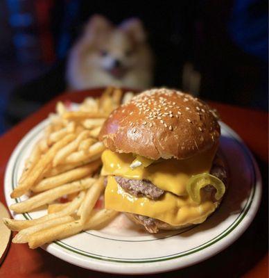 The B-Side Burger: Two house beef patties, yellow american cheese, pickles, firebrand challah bun ($16 + $4 fries)