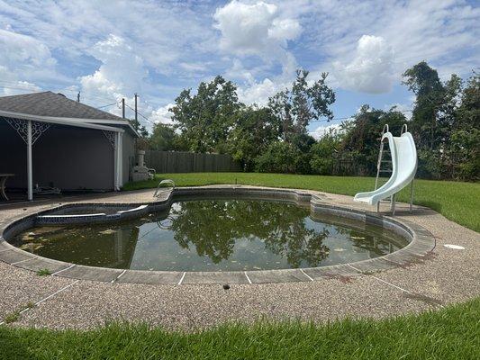 Just one of the many green pools in Houston TX we have bought and turned into a back yard oasis!