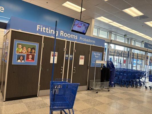 Fitting rooms at the front of the store
