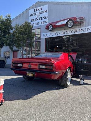 Complete refinish in candy red! Customer specified a complete chrome delete. All trim powder coated.