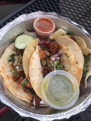 Delicious tacos -- al pastor, chorizo, and birria.