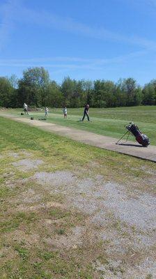 Large tee box can handle a number of golfers at the same time.