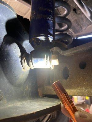 Nut not completely tightened resulting in bushing being worn out