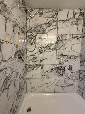 Large format tile in bathroom shower