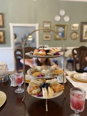 Tiered stand with treats and iced tea taken during Afternoon Tea
