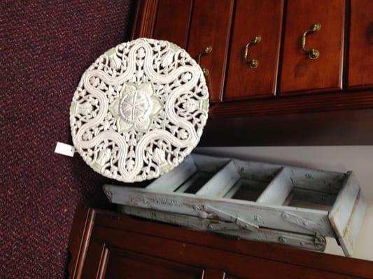 Yelp? My photo? 3ft disk was mass-produced; the short not-vintage ladder was painted & rubbed. 'Shabby-chic' items - $69 EACH!