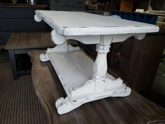 Painted and distressed white coffee table.