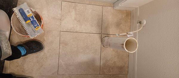 Tile reinstalled and allowed 24hrs to properly set..next step is grouting.