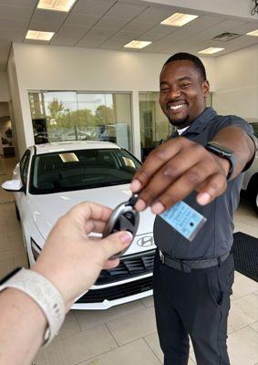 Gentry handing over the keys to my new baby!