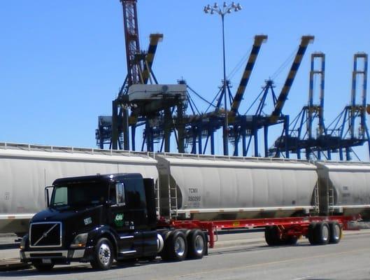 One of our new trucks in the Port picking up a container.