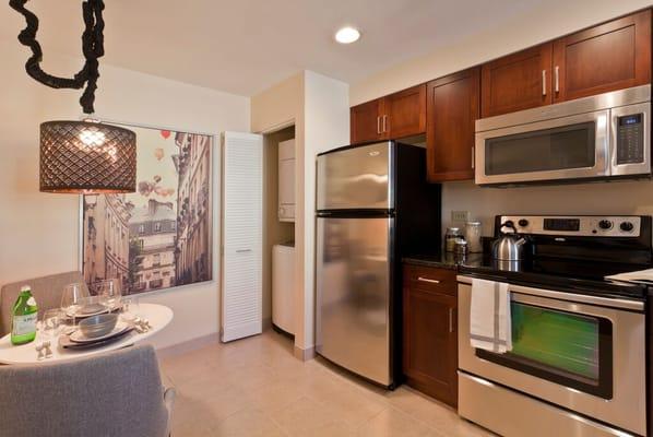 Elegant designer cabinets accented by granite countertops