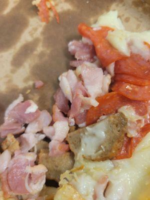 Raw bacon in my Stromboli!