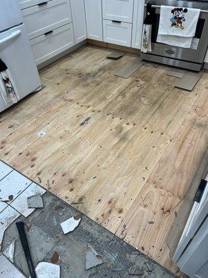Previous kitchen floor nightmare, wooden planks