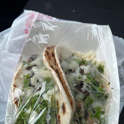 Barbacoa with cilantro, onions and cheese