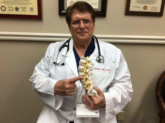 Dr. Duplantis explaining low back pain