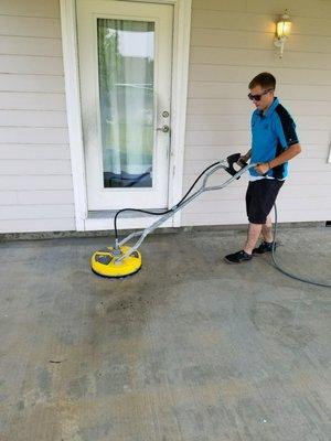 Working with the surface cleaner and clean up cement surfaces!