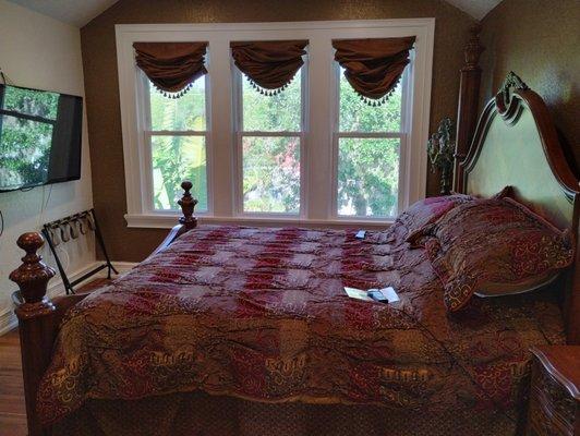 Dancing Horse Room has a King bed.  Coffee bar, TV, private bath w/ shower, mini fridge and free wifi