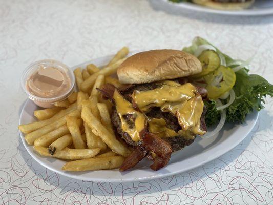 Bacon cheese burger with added patty +$3 for the extra patty.
